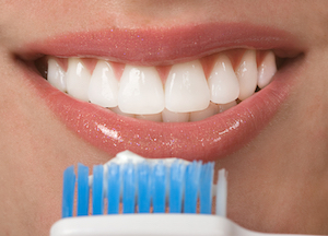 cosmetic dental - photo of toothbrush and smile